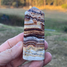 Load image into Gallery viewer, Brown Aragonite Crystal Tower Point Generator

