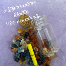 Load image into Gallery viewer, Crystal Creativity Affirmation Crystal set in a bottle
